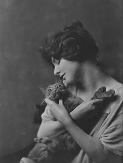 Adored Collection: Bermicchi, Miss, with Buzzer the cat, portrait photograph, 1916. Creator: Arnold Genthe