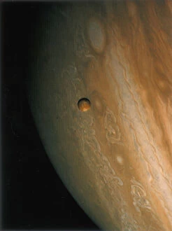 Space exploration Collection: Jupiter and Io, one of its moons, 1979