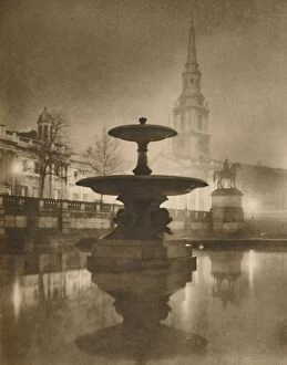 Raining Collection: Night Rain Has Turned The Pavements To A Pool of Reflections, c1935. Creator: Calkin