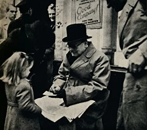 Winston Churchill Collection: Signing Autographs in the North Country, c1945. Creator: Unknown
