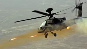 Related Images Jigsaw Puzzle Collection: Apache Helicopter Firing Rockets