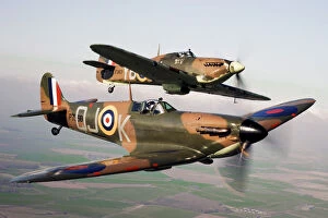 Battle of Britain Pillow Collection: Spitfire P7350, flies alongside Hurricane LF363