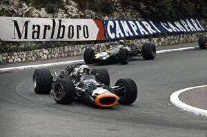 John Ford Fine Art Print Collection: 1969 Monaco Grand Prix: John Surtees, B. R. M. P138, retired, leads Jack Brabham