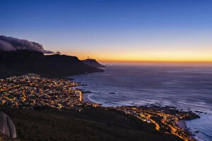 Suburb Collection: Cape Town Skyline and Camps Bay with clouds over the Twelve Apostles Mountains at dusk, South Africa