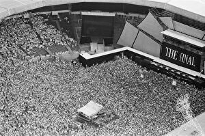 Entertainment Photo Mug Collection: Aerial photo shows the 1000s of fans attending Wham ! The Farewell Concert at Wembley