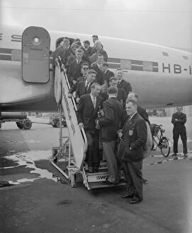 Boarding Collection: The England football team leave London Airport bound for Switzerland to participate in