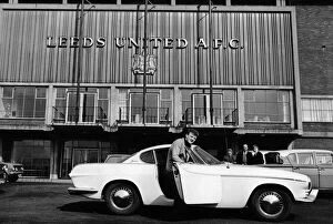 Sporting Venues Greetings Card Collection: Leeds United captain Billy Bremner getting into his car outside Elland Road