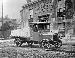 Related Images Collection: A lorry from the Hercules Bakery seen here outside Priday Metford mill, Gloucester docks
