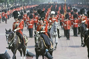 Trooping the Colour Framed Print Collection: Her Majesty Queen Elizabeth II rides on horseback through The Mall in Central London
