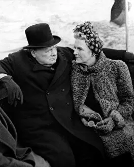 Man And Woman Collection: Sir Winston Churchill and wife Clementine seen here returning by boat after an inspection