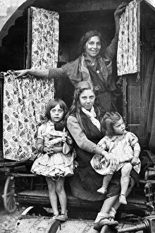 Gypsy Collection: A typical gypsy family at the door of their caravan at the 700 year old fair at Yarm