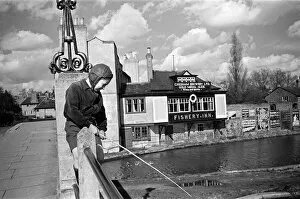 Hemel Hempstead Collection: A young boy fishing in the Grand Union canal at Boxmoor, Hertfordshire. Circa 1945