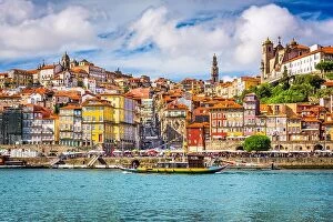 Cathedrals Photographic Print Collection: Porto, Portugal old town skyline from across the Douro River