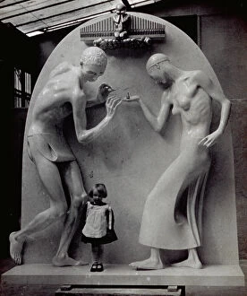Authors Poster Print Collection: The picture shows a little girl at the base of the sculpture The Family, by Adolfo Wildt